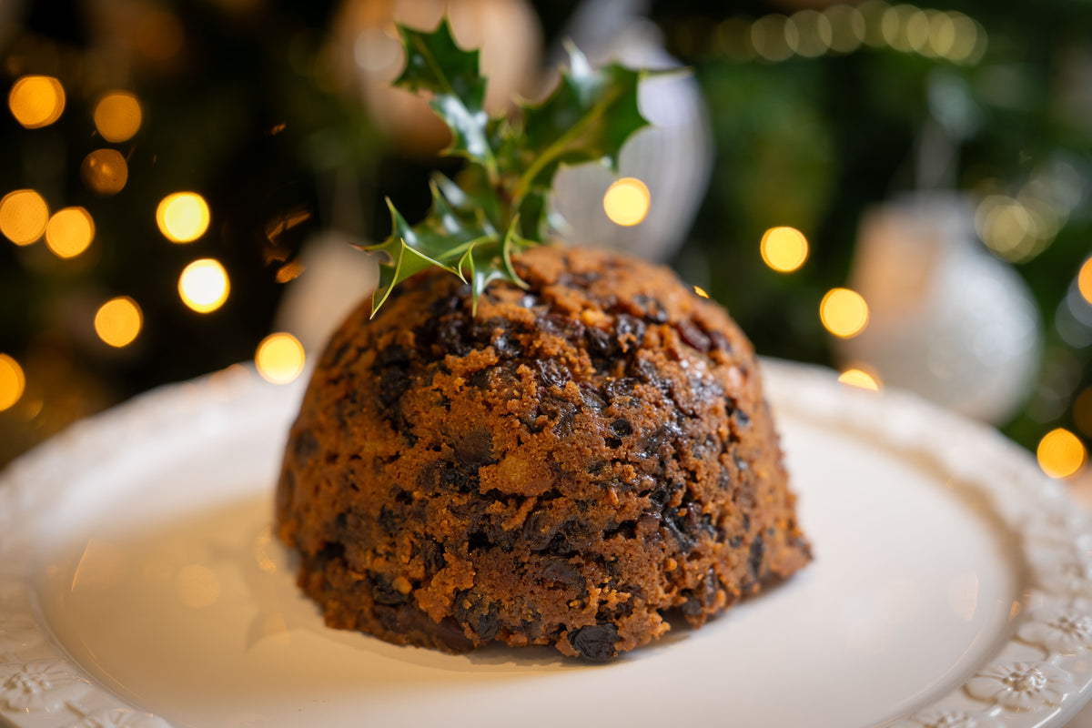 Marshall's traditional handmade Christmas pudding with rich dried fruit, served warm at Christmas