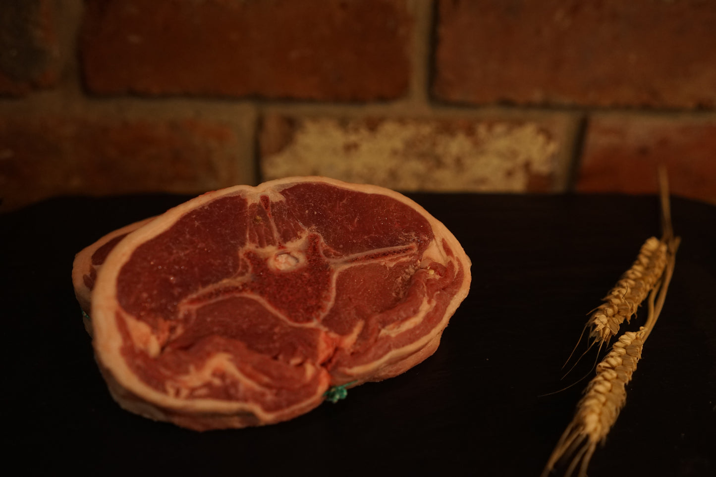 2 Barnsley Chops on a slate chopping board