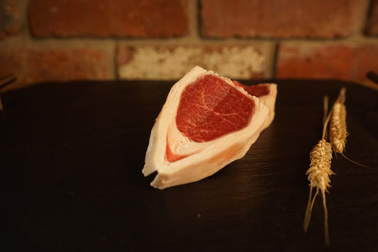 A cut of Lamb Valentine on a slate chopping board