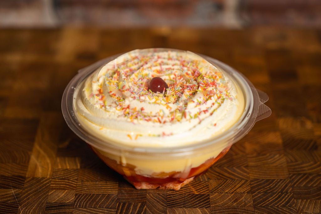 Marshall's homemade traditional trifle layered with sponge, fruit, jelly, custard and whipped cream