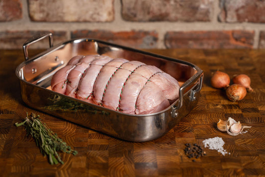 Boneless butterflied turkey breast rolled and tied ready for roasting
