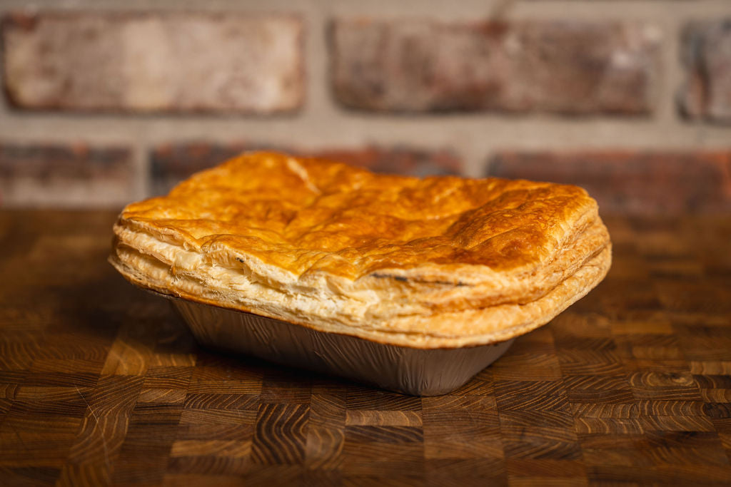 Marshall’s handmade creamy chicken and home-cured ham pie with puff pastry lid