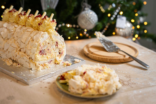Handmade lemon, raspberry and white chocolate meringue roulade with fresh cream at Marshall's Farm Shop